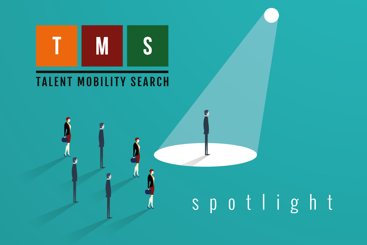 Talent Mobility Search Spotlight - Image of three women and four men with one man in a spotlight.